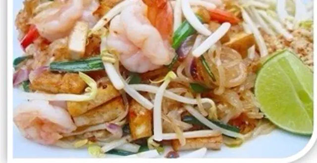A close crop of pad Thai with shrimp