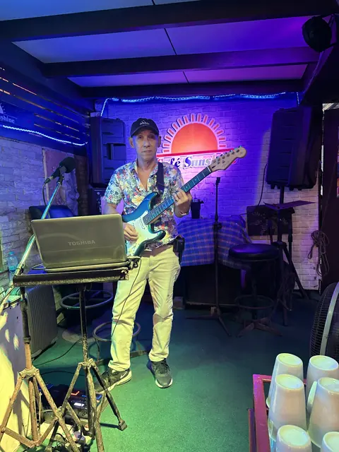 A performer on the Sunshine Cafe stage