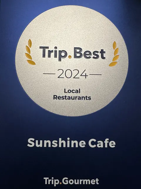 Trip.Best 2024 Local Restaurants recognition plaque naming Sunshine Cafe